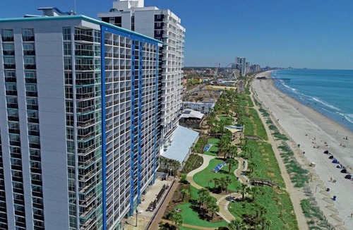 Downtown Myrtle Beach Apartment | Beachfront Beauty: King Room with Scenic Balcony