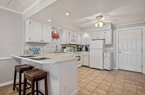 South Nags Head Condo | Beachfront Condo with Private Patio and 2 Pools