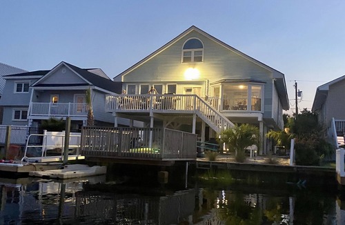North Myrtle Beach House | Beautiful home on the channel in Cherry Grove with POOL and Hot Tub