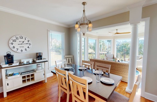 Ocean Point House | Beautiful home with open porches overlooking lagoon in Wild Dunes