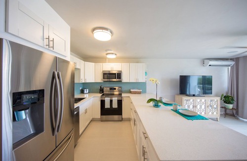 Kuau Condo | BEAUTIFUL NEW Beach-chic condo with AC 1 mile from Paia & Steps to Mama's Beach
