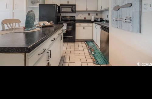 Garden City Condo | Beautiful oceanfront Condo with direct access to the beach, steps from the sand.