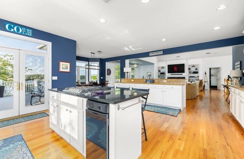 Olde Ferry Estates House | Big Water Lodge | Hot Tub, Fire Pit, & Lake Views