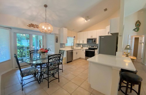 Butler Beach House | Bikini Bungalow - King Beds and Short Walk to the Beach! Pet Friendly!