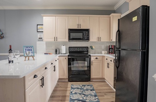Central Myrtle Beach Condo | Brand new amazing family/golfer retreat with lake & pool view & Elevator