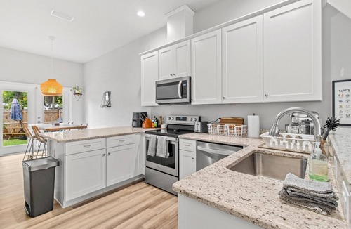 Pleasant Street House | Breezy Blue Bungalow in Heart of Pleasant Street