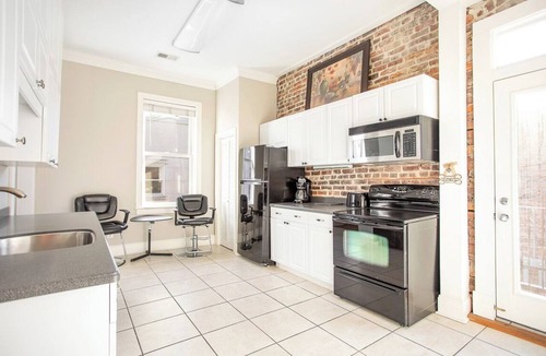 Historic District - North Apartment | Bright Downtown Loft Amidst Nightlife Near City Market by Lucky Savannah