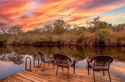Fort White Cabin | Camp Manatee - Riverfront Cabin, Stunning Views, Pet-Friendly, Hot tub + Kayaks!