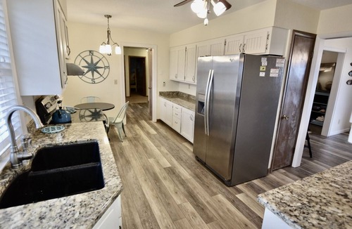 Frisco House | Canal Front Home with a Dock and Hot Tub minutes from the beach!