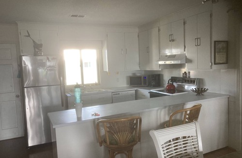 Holden Beach Cottage | Charming Beach House with Front and Back Porch water views