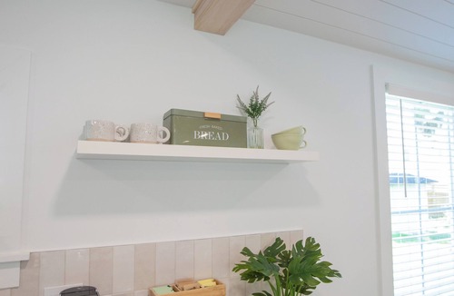 Butler Beach Cottage | Charming Cottage with Sauna, MINI Golf, 2 OD Showers, Fire-pit, Soaking Tub Dogs