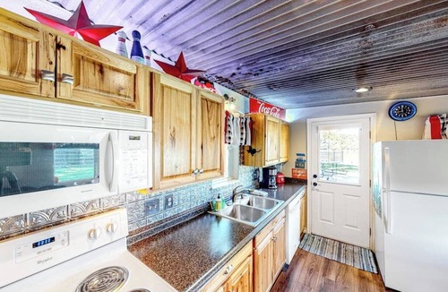 Kingsland House | Charming dog-friendly lakefront home with lake view, dock, & washer/dryer