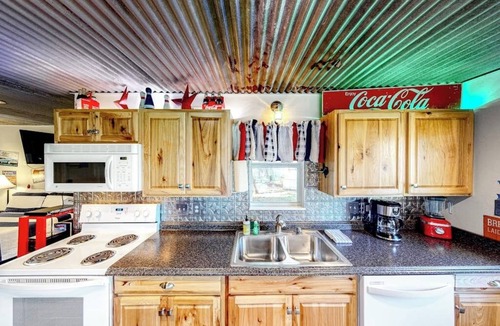 Kingsland House | Charming dog-friendly lakefront home with lake view, dock, & washer/dryer