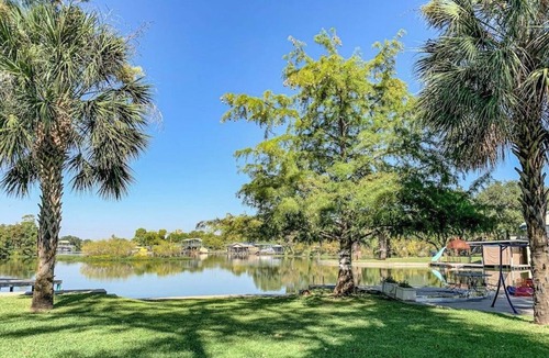 Kingsland House | Charming dog-friendly lakefront home with lake view, dock, & washer/dryer