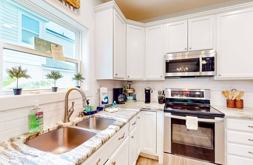 Butler Beach House | Charming home steps from the beach with enclosed yard and grill - dog-friendly