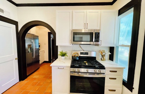 Sayles Blvd. Area House | Charming Spanish Revival Villa, Historic Sayles Neighborhood, Sleeps 8!