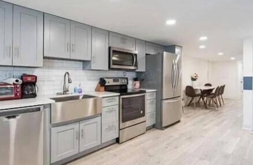 Columbia Heights House | Charming townhome ground floor/basement unit