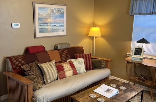 Dothan Apartment | Claire’s Cottage is located on 7 secluded acres with a coded privacy gate.