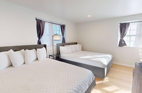Lower Township Hotel | Comfortable Coastal Retreat with Two Queen Beds & Sleeper Sofa - Suite Room