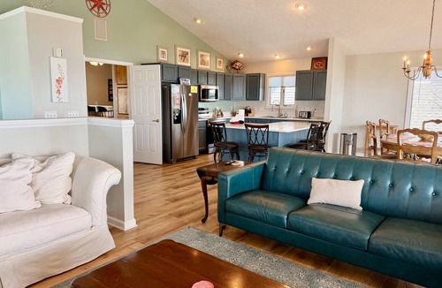 Long Beach Hotel | Coral House: Spacious oceanview retreat in Oak Island, NC, perfect for families.
