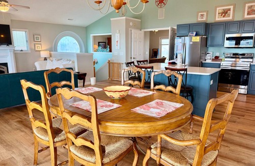 Long Beach Hotel | Coral House: Spacious oceanview retreat in Oak Island, NC, perfect for families.