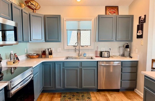 Long Beach Hotel | Coral House: Spacious oceanview retreat in Oak Island, NC, perfect for families.