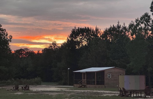 Clarendon Cabin | Cozy Cabin With Screened in Porch and Pond View