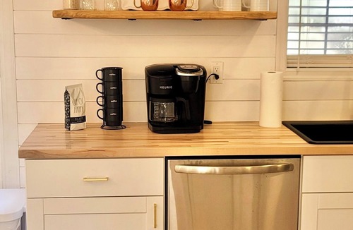 Kill Devil Hills Cottage | Cozy Cottage with Hot tub & Firepit! Near the Beach & Sound!