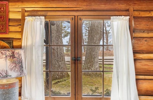 Forest Beach Cabin | Dancing Bear Cabin: Authentic storybook log cabin with Lake Michigan views