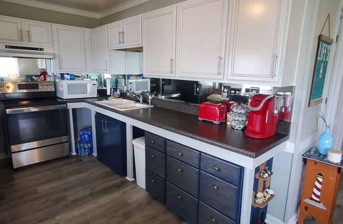 Surf City Cottage | Deep-Water Canal Front Coastal Cottage Only Steps to the Beach & Pet Friendly!