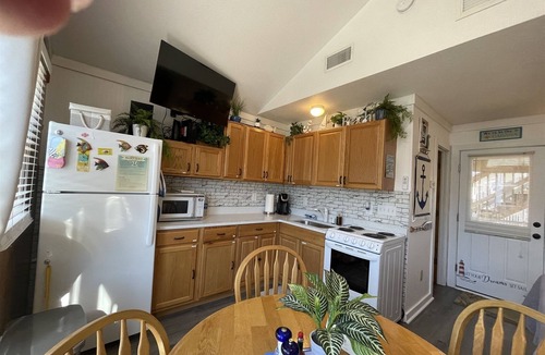 Hatteras Condo | Discover a hidden treasure at this unique, comfortable cabana Foolish Endeavor!