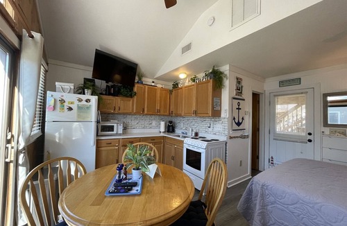 Hatteras Condo | Discover a hidden treasure at this unique, comfortable cabana Foolish Endeavor!