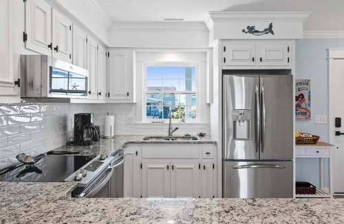 Holden Beach House | Discover Mom's Gift in Holden Beach: a 2-bed, 3-bath duplex for unforgettable family getaways.