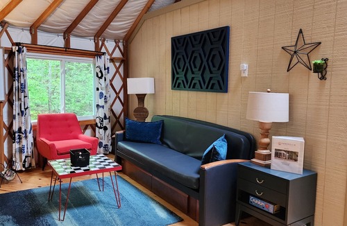 Mill Spring House | Dog friendly 30' Yurt, large dome skylight, king bed, 2 bedrooms, sleeps 6.