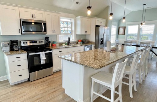 Ocracoke House | Dog Friendly close to Ocracoke's beaches, screened porch, deck views
