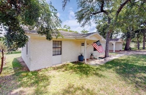 Granite Shoals House | Dog-friendly waterfront home with dock, grill, water views, patio, washer/dryer