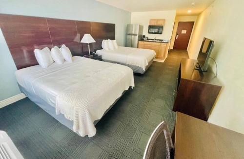 Cuero House | Double Queen With Kitchenette at FairBridge Inn & Suites Cuero, Free Parking!