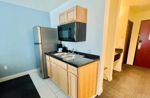 Cuero House | Double Queen With Kitchenette at FairBridge Inn & Suites Cuero, Free Parking!