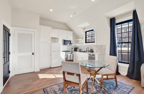 Hitch Village - Fred Wessels Homes Apartment | “ Elegant Carriage House Studio on the River”