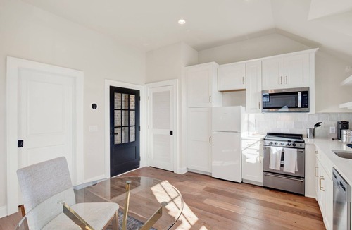 Hitch Village - Fred Wessels Homes Apartment | “ Elegant Carriage House Studio on the River”
