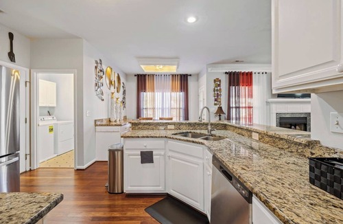 Varina House | Elegant Retreat: Spacious with Outdoor Fireplace