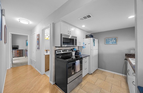 Point Venture House | Enjoy lake views from 2 decks! Walk to pool, gym & golf course. Lake access.