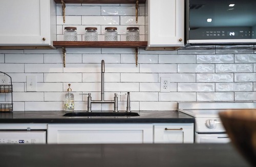 Windsor Park House | Euro-inspired 1-br cottage with AC, w/d, private fenced yard in central Austin