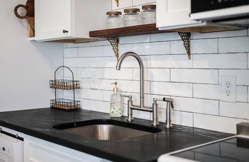 Windsor Park House | Euro-inspired 1-br cottage with AC, w/d, private fenced yard in central Austin