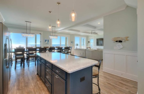 Long Beach House | Experience luxury at Beach Landing Too, an oceanfront house in Oak Island with 7 bedrooms.