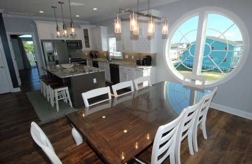 Sunset Beach House | Experience luxury at 413 SSB - Lucky Old Sun: a 5BR 5BA retreat in beautiful Sunset Beach.