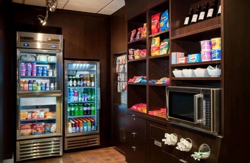 North Myrtle Beach Hotel | Explore Barefoot Landing then Relax in Indoor Pool Retreat | 4 Rooms