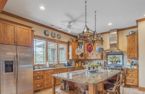 Steele Creek House | Extraordinary Lake Front Home with boat dock , private deck and fire pit by RedAwning
