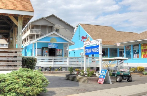 Vaught Condo | Fantastic Condo Adjacent to Harry the Hats and Across from the Apache Pier -