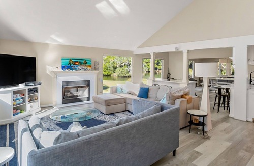 Blue Heron Lake House | Fenced backyard w/ pond, fire pit, screened porch, ping pong, Golf cart incl.